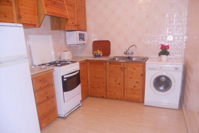 Kitchen and laundry of the apartment Jardín Playa 3.