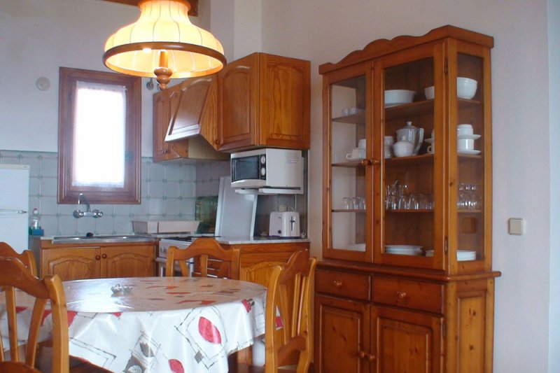 Part of the kitchen and dining room of the Rocas Marinas 8A apartment.