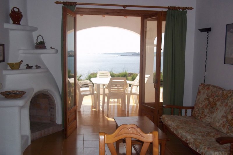Living room of the Rocas Marinas 1 apartment towards the terrace.