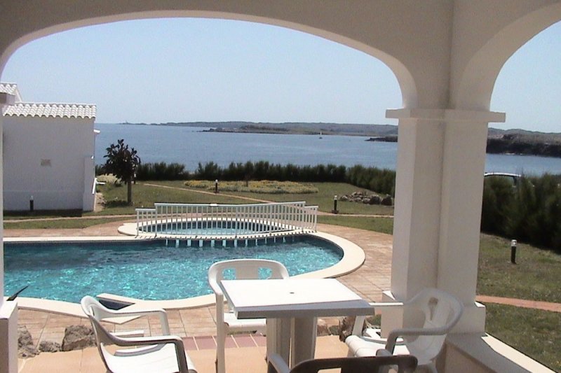 View towards the pool of the complex, from the terrace of the Rocas Marinas 7A apartment